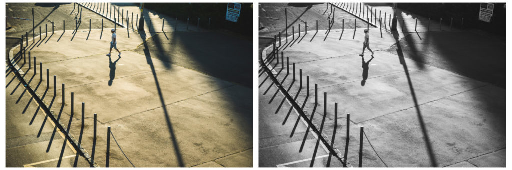 This photo is full of lines that supplement the main line formed by the figure’s shadow. In black and white the clearer contrast makes them more visible, and so they support the highly geometric conception of this picture overall. Sony A7, FE 50 mm f/1.8, 1/160 s, f/8, ISO 125, focal length 28 mm